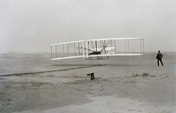 The Wright Flyer's first flight at Kitty Hawk, 17 December 1903