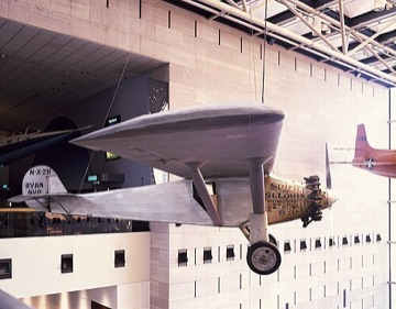 The Spirit of St. Louis hanging in the museum's Milestones of Flight hall